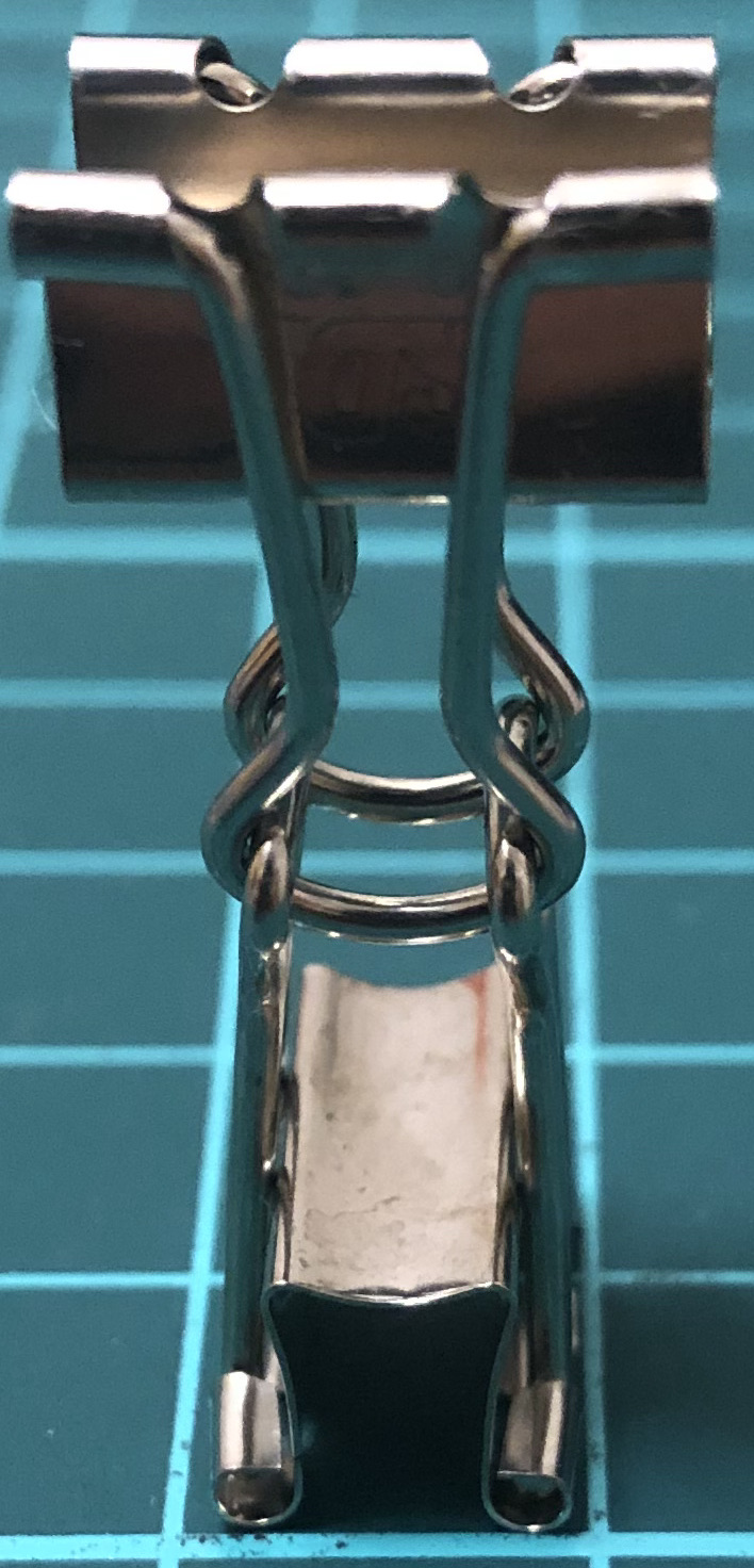 2 binder clips hold back to back
