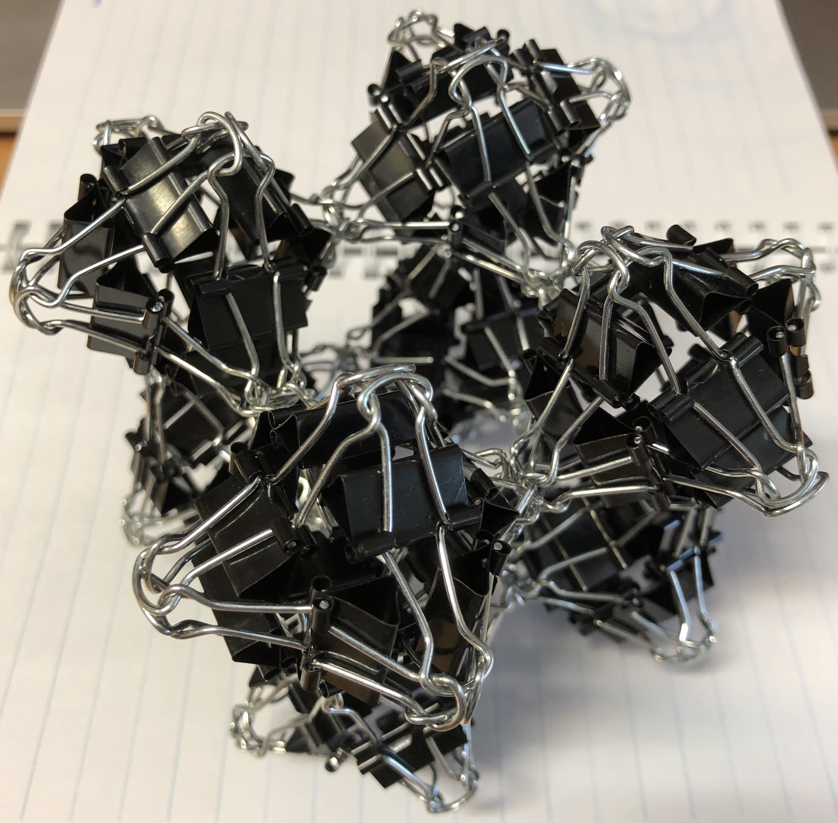 12 clips forming spiky octahedron, 8 of that forming cube